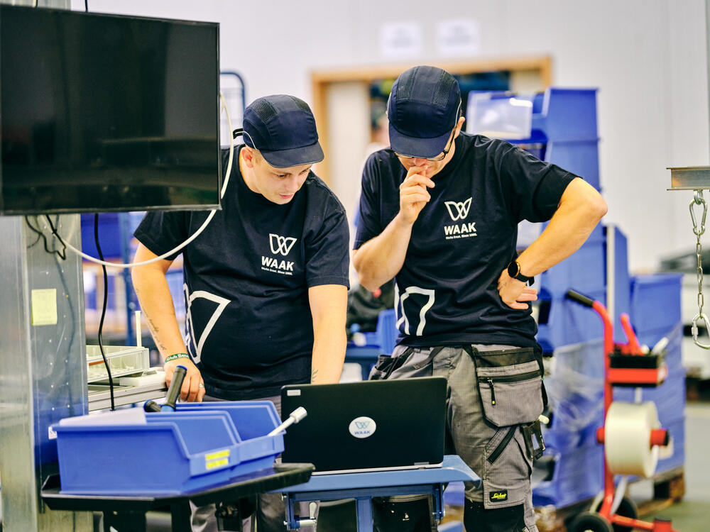 WAAK two cable assembly employees